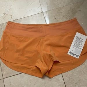 Lululemon speed up short monarch orange NWT 8